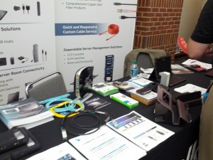 At Belkin's booth, with several of their networking products on display.